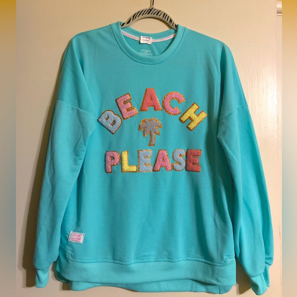 Aqua-colored “Beach Please” Pullover